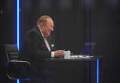 Presenter Andrew Neil prepares to broadcast from a studio during the launch event for new TV channel GB News.