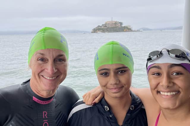 Louise Minchin during her swim from Alcatraz to San Francisco with long-distance swimmers Anaya and Mitali Khanzode. Pic: Contributed