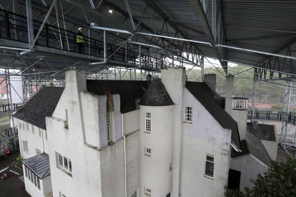 A giant steel box was built around the property in Helensburgh in 2019 to protect its saturated walls from further damage from the elements and enable it to gradually dry out as the first stage in a long-term conservation programme. Photo: Andrew Milligan/PA Wire