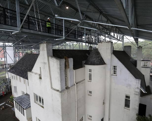 A giant steel box was built around the property in Helensburgh in 2019 to protect its saturated walls from further damage from the elements and enable it to gradually dry out as the first stage in a long-term conservation programme. Photo: Andrew Milligan/PA Wire