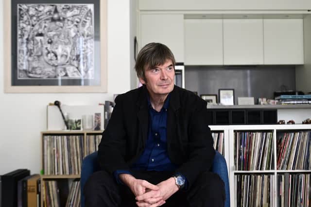 Author Ian Rankin, whose new ebook The Rise, is published by Amazon Original Stories this month, surrounded by his vinyls and CDs in the Edinburgh apartment where he writes his novels. Pic: John Devlin