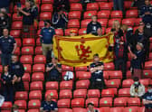 Scotland supporters unfurl a ‘Lion Rampant’ flag ahead of a game at Hampden – but would it pass muster in the Court of Session?