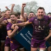 Marr RFC players celebrate with the Tennents Premiership trophy after defeating Currie Chieftains in the play-off final at Mallery Park.