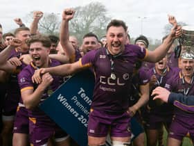 Marr RFC players celebrate with the Tennents Premiership trophy after defeating Currie Chieftains in the play-off final at Mallery Park.