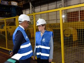 First Minister Nicola Sturgeon with GFG's Sanjeev Gupta at the Dalzell steel plate mill in Motherwell in 2016. Picture: Alan Watson