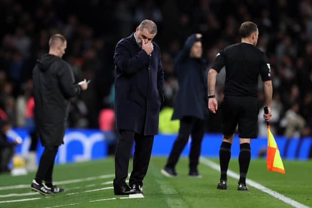 Ange Postecoglou cuts a dejected figure during Spurs' defeat by Chelsea.