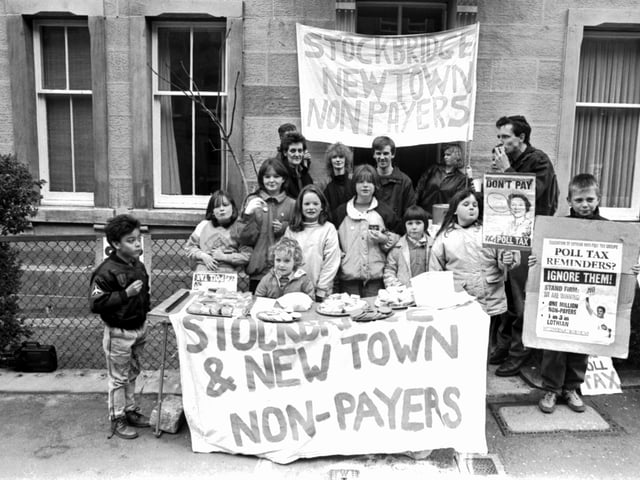 Children enjoying a Stockbridge & New Town Non-Payers' anti-Poll Tax tea party in Dean Park Street Edinburgh, April 1990.