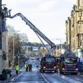 Emergency services at the scene at the New County Hotel in Perth where three people have died following a fire.