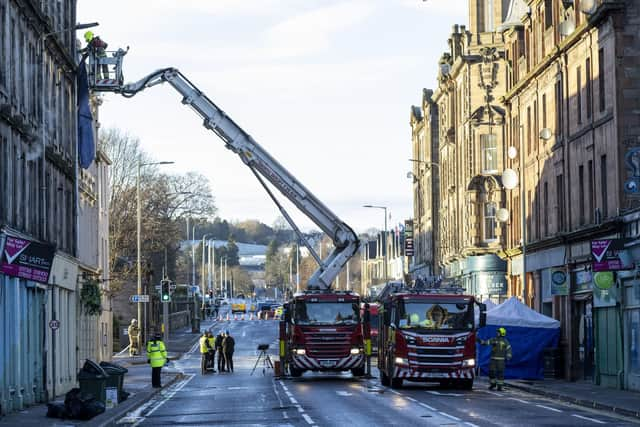 Emergency services at the scene at the New County Hotel in Perth where three people have died following a fire.