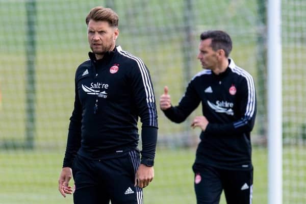 Coach Alan Russell and Stephen Glass during an Aberdeen training session at Cormack Park on June 21, 2021.  (Photo by Ross MacDonald / SNS Group)