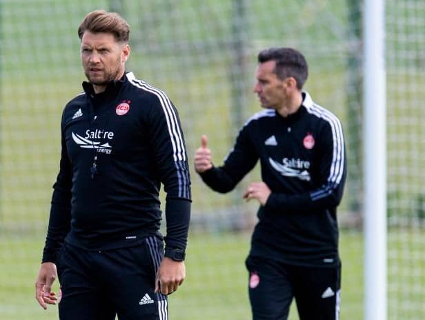Coach Alan Russell and Stephen Glass during an Aberdeen training session at Cormack Park on June 21, 2021.  (Photo by Ross MacDonald / SNS Group)