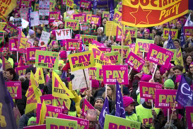 Members of the Educational Institute of Scotland (EIS) join teachers at a rally outside the Scottish Parliament in a protest over pay. Picture: Jane Barlow/PA Wire