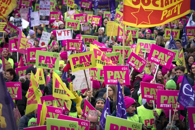 Members of the Educational Institute of Scotland (EIS) join teachers at a rally outside the Scottish Parliament in a protest over pay. Picture: Jane Barlow/PA Wire