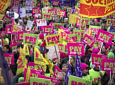 Members of the Educational Institute of Scotland (EIS) join teachers at a rally outside the Scottish Parliament in a protest over pay. Picture: Jane Barlow/PA Wire