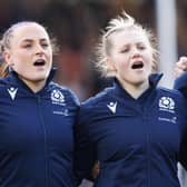 Scotland's Caity Mattinson, Evie Gallagher and Alex Stewart during the national anthems against France.