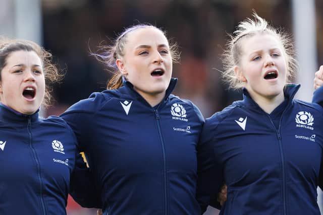 Scotland's Caity Mattinson, Evie Gallagher and Alex Stewart during the national anthems against France.