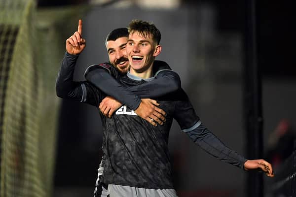 Liam Shaw celebrates scoring his first goal for Sheffield Wednesday alongside Scotland attacker Callum Paterson.