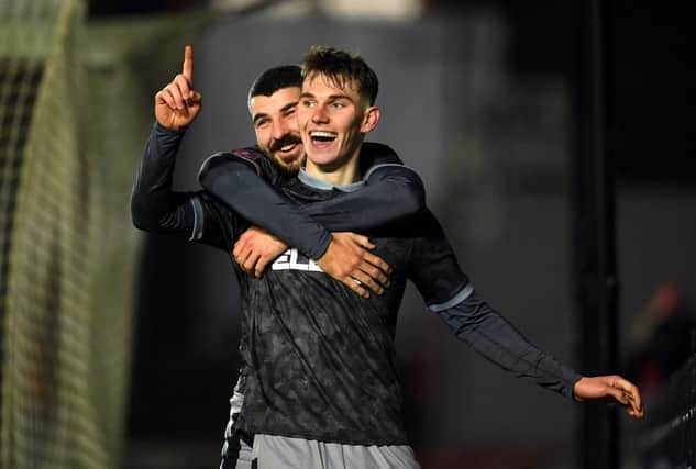 Liam Shaw celebrates scoring his first goal for Sheffield Wednesday alongside Scotland attacker Callum Paterson.