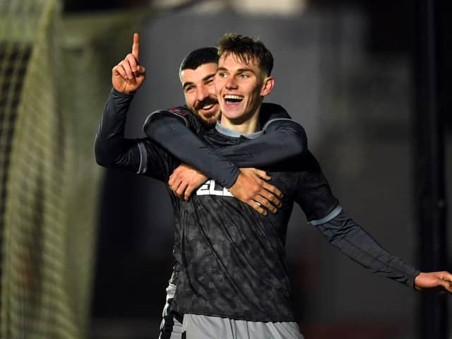 Liam Shaw celebrates scoring his first goal for Sheffield Wednesday alongside Scotland attacker Callum Paterson.