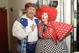 Andy Gray (Buttons) and daughter Clare Gray (Wicked Sister) meet backstage during Cinderella at the  Kings Theatre