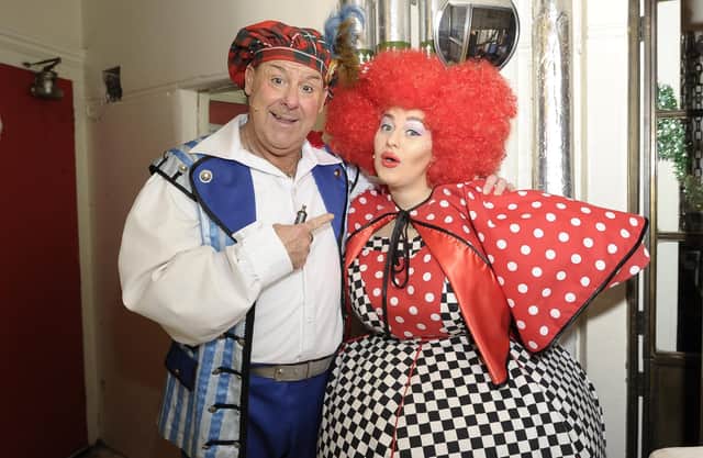 Andy Gray (Buttons) and daughter Clare Gray (Wicked Sister) meet backstage during Cinderella at the Kings Theatre