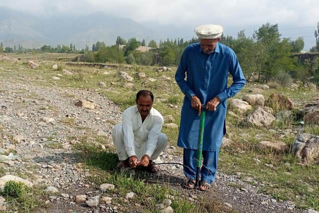 Cycle pumps are used to pump air into the water pipeline. Picture: Muhammad Daud Khan