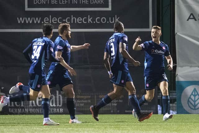 Hamilton's Marios Ogkmpoe (centre) celebrates making it 1-1 with his team-mates against Aberdeen.