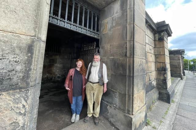 Hidden Door festival manager Hazel Johnson and blacksmith Colin Thomasson at the revived main entrance to the old Royal High School on Calton Hill.