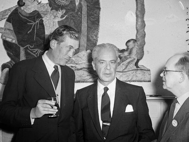 American film director John Huston and producer Walter Wanger at the Edinburgh Film Festival in 1954.