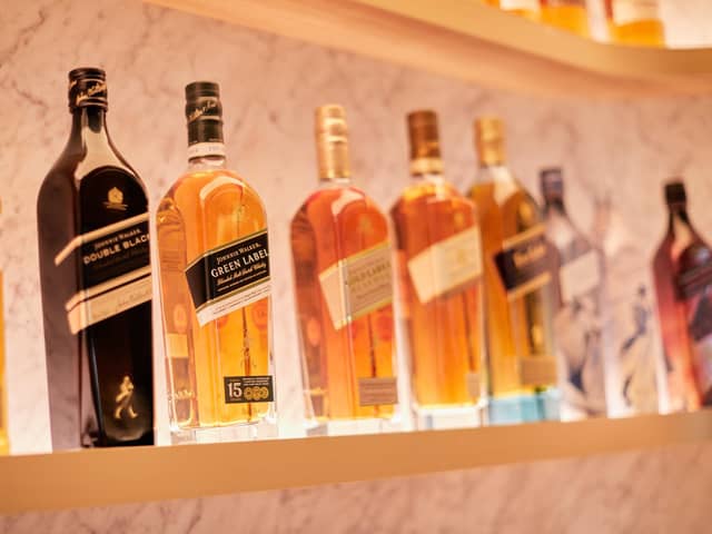 FTSE-100 spirits giant Diageo has a vast portfolio that includes Johnnie Walker whisky, pictured, Guinness stout and Smirnoff vodka.