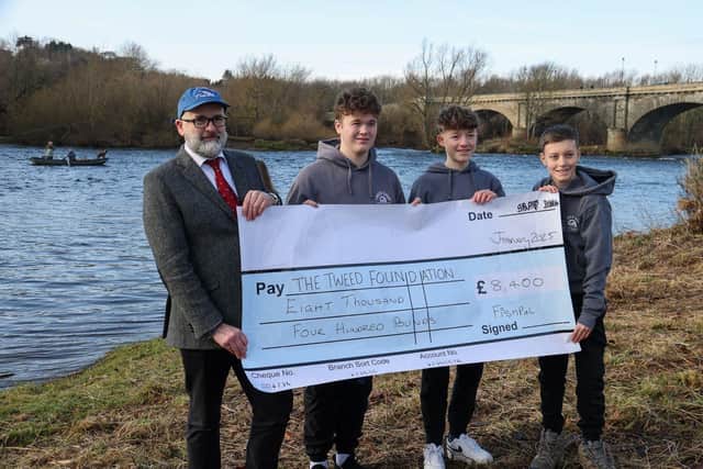 The one that didn't get away: three TweedStart Ambassadors land a cheque for £8,400 from expert angler Will Draper, Head of FishPal (left), at the opening of this year’s River Tweed salmon season. (Copyright FishPal).