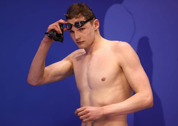 Duncan Scott of Team University of Sterling celebrates after winning the men's 200m freestyle final.