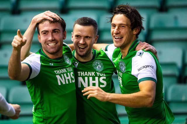 Jamie Murphy celebrates with Steven Mallan and Joe Newell after scoring to make it 1-0 to Hibs during the Scottish Premiership match against Celtic at Easter Road, on November 21, 2020 (Photo by Craig Foy / SNS Group)
