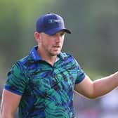 Matt Wallace acknowledges the crowd on the 18th green during the third round of the DP World Tour Championship on the Earth Course at Jumeirah Golf Estates in Dubai. Picture: Ross Kinnaird/Getty Images.