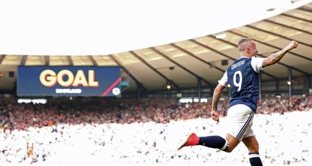 Leigh Griffiths wheels away after his memorable double strike against Englnand in 2017.