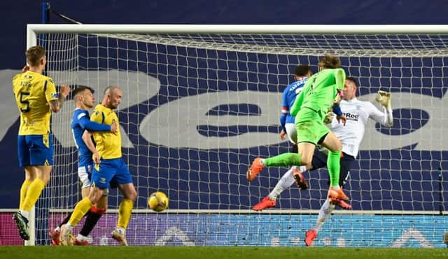 Zander Clark's downward header is turned in by St Johnstone striker Chris Kane to make it 1-1 in stoppage time during the dramatic Scottish Cup tie at Ibrox. (Photo by Rob Casey / SNS Group)