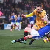 Livingston's Nicky Devlin and Rangers' Ryan Kent could both leave their respective clubs in the summer. (Photo by Craig Foy / SNS Group)