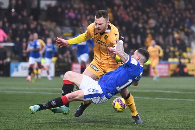 Livingston's Nicky Devlin and Rangers' Ryan Kent could both leave their respective clubs in the summer. (Photo by Craig Foy / SNS Group)