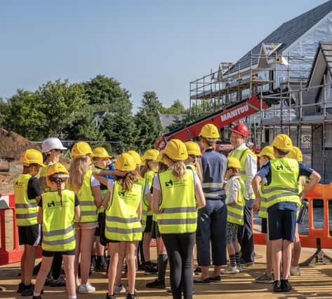 Pupils at the Drumrossie Homes Rothney West construction site. (Pic: Niall Hastie)