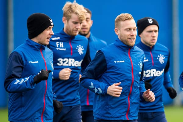 Barry Ferguson believes it is "absolutely crucial" Michael Beale extends the deals of Ryan Jack and Scott Arfield. (Photo by Ross Parker SNS Group)