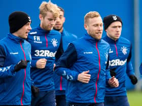 Barry Ferguson believes it is "absolutely crucial" Michael Beale extends the deals of Ryan Jack and Scott Arfield. (Photo by Ross Parker SNS Group)
