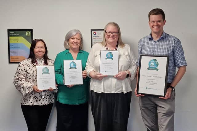 The Home Instead West Lothian team with their current and previous home care awards.