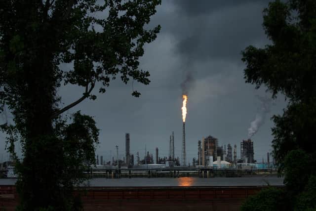 A gas flare from a Shell Chemical petroleum refinery illuminates the sky in Norco, Louisiana (Picture: Drew Angerer/Getty Images)