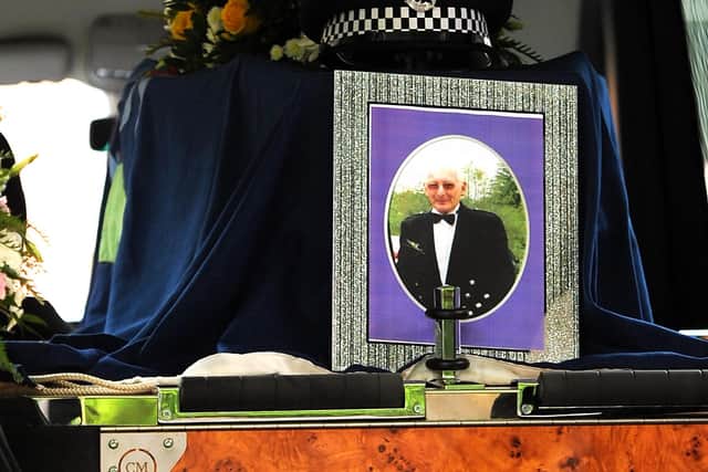 Funeral of Sandy Marr. Police flag draped over Sandy's coffin. Pic: Fife Photo Agency.