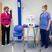 Nicola Sturgeon has said she will receive the vaccine on live television if it would help to convince people it is safe.