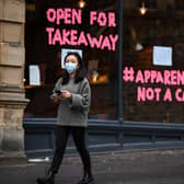 A 'restaurant' on Edinburgh's Cockburn Street makes a point about the current Covid restrictions (Picture: Jeff J Mitchell/Getty Images)