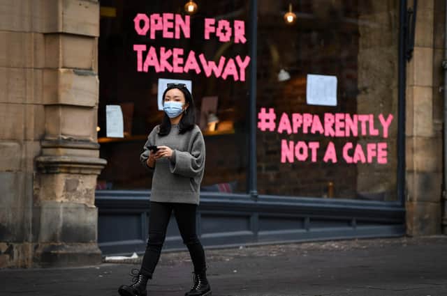 A 'restaurant' on Edinburgh's Cockburn Street makes a point about the current Covid restrictions (Picture: Jeff J Mitchell/Getty Images)