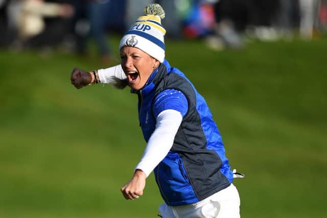 Suzann Pettersen, who had been handed a controversial wildcard by Catriona Matthew, celebrates after holing the winning putt in the 2019 Solheim Cup at Gleneagles. Picture: Andy Buchanan/AFP.