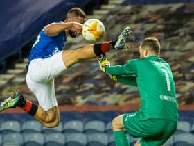 Rangers striker Kemar Roofe catches Slavia Prague goalkeeper Ondrej Kolar in the face with his boot before receiving a red card during the Europa League match at Ibrox on March 18  (Photo by Alan Harvey / SNS Group)