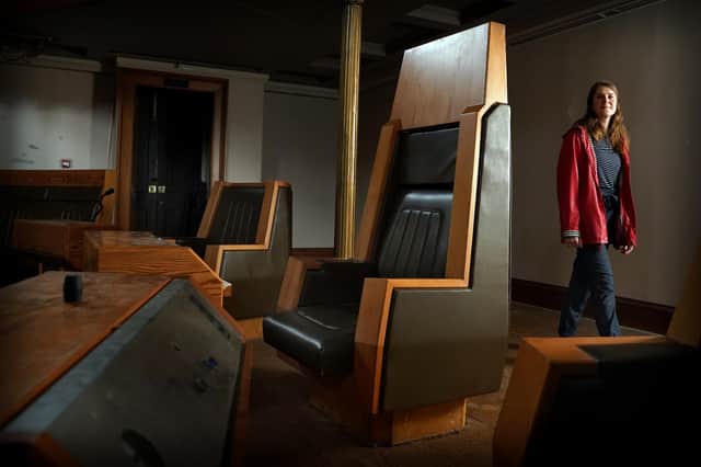 Georgia Vullinghs, Assistant Curator of Modern and Contemporary History, at the National Museum of Scotland, alongside the "Speaker's Chair" at the old Royal High School building on Calton Hill. Picture: Stewart Attwood